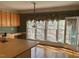 Bright kitchen with large windows and a door leading to the outside at 208 E Jules Verne Way, Cary, NC 27511