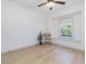 Well-lit bedroom with a window bench and hard wood floors at 209 Dickens Dr, Raleigh, NC 27610