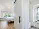 Open bedroom layout with adjoining bathroom showcasing a walk-in shower at 209 Dickens Dr, Raleigh, NC 27610