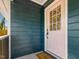 A beautiful front door with stained glass window, and a 'Welcome' mat at 209 Dickens Dr, Raleigh, NC 27610