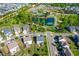 Aerial view showcasing community amenities including a pool and pond surrounded by residential houses at 240 Liberty Star Rd, Wendell, NC 27591