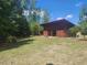 Well-maintained community area with a pavilion, grassy lawn, and trees, great for outdoor recreation at 240 Liberty Star Rd, Wendell, NC 27591