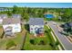 Aerial view of a two-story home with a fenced yard, deck, and proximity to community amenities at 240 Liberty Star Rd, Wendell, NC 27591