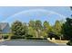 A charming street view with a rainbow showcasing the community's picturesque setting and beautiful surroundings at 240 Liberty Star Rd, Wendell, NC 27591