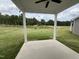 Back patio featuring a view of construction and the tree line at 244 Bluejay St, Clayton, NC 27520