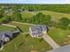 Aerial shot of a home and spacious backyard with new roof and landscaping at 28 Lee Woods Dr, Clayton, NC 27520