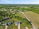 Aerial view highlighting the neighborhood setting and expansive green space surrounding the property at 28 Lee Woods Dr, Clayton, NC 27520