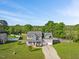 Charming two-story home with a welcoming front porch and manicured lawn at 28 Lee Woods Dr, Clayton, NC 27520