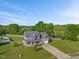 Two-story home with a manicured lawn and a spacious two-car garage at 28 Lee Woods Dr, Clayton, NC 27520