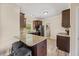 Charming kitchen featuring granite countertops, stainless steel appliances, and an adjacent laundry room at 28 Lee Woods Dr, Clayton, NC 27520