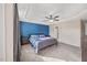 Large main bedroom featuring a trey ceiling, ceiling fan, plush carpeting, and neutral decor at 28 Lee Woods Dr, Clayton, NC 27520
