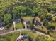 Aerial view of several homes surrounded by lush forest at 2804 Brenfield Dr, Raleigh, NC 27606