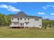 Spacious home featuring a backyard with a wooden deck, perfect for outdoor gatherings at 2804 Brenfield Dr, Raleigh, NC 27606