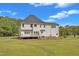 Spacious home featuring a backyard with a wooden deck, perfect for outdoor gatherings at 2804 Brenfield Dr, Raleigh, NC 27606