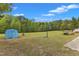 Wide open backyard with shed and basketball goal at 2804 Brenfield Dr, Raleigh, NC 27606