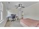 Carpeted bedroom with a ceiling fan, natural lighting, and ample space for a desk setup at 2804 Brenfield Dr, Raleigh, NC 27606