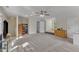 Spacious bonus room features natural light, a ceiling fan, neutral carpet, and versatile layout at 2804 Brenfield Dr, Raleigh, NC 27606