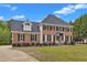 Lovely brick two-story home with a charming dormer and a well-kept lawn at 2804 Brenfield Dr, Raleigh, NC 27606