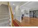 Spacious living room with hardwood floors, fireplace, and built-in shelving at 2804 Brenfield Dr, Raleigh, NC 27606