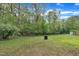 A spacious, level backyard with ample green space, perfect for outdoor activities at 308 Plaza Dr, Garner, NC 27529