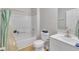Updated bathroom featuring a shower, vanity, and neutral walls at 308 Plaza Dr, Garner, NC 27529