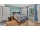 Serene bedroom featuring a cozy bed, neutral tones, and a bright window at 308 Plaza Dr, Garner, NC 27529