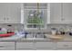 Kitchen sink with a view to the yard at 308 Plaza Dr, Garner, NC 27529