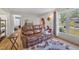 Comfortable living room with large windows, offering a view of the outdoors at 308 Plaza Dr, Garner, NC 27529