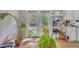 Sunroom showing plants and access to exterior at 308 Plaza Dr, Garner, NC 27529