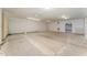 Large unfinished basement featuring concrete flooring and white walls at 317 William Dr, Benson, NC 27504