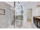 Bathroom featuring a walk-in shower with tile surround, and double vanity at 3338 Prospect Parkway Pkwy, Durham, NC 27703