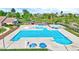 An expansive community pool area with multiple pools, lounge chairs, and picnic tables at 3338 Prospect Parkway Pkwy, Durham, NC 27703