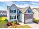 Beautiful two-story home boasting well-maintained lawn, and complementary two-car garage at 3338 Prospect Parkway Pkwy, Durham, NC 27703