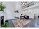 Bright and airy living room with high ceilings, a fireplace, and access to the outdoors at 3338 Prospect Parkway Pkwy, Durham, NC 27703