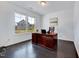 Bright office space featuring dark hardwood floors, a large desk, and ample natural light at 3338 Prospect Parkway Pkwy, Durham, NC 27703
