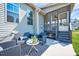 Patio with a seating area, an outdoor rug, steps to the screened-in back porch at 3338 Prospect Parkway Pkwy, Durham, NC 27703