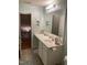 Cozy bathroom featuring a well-lit vanity with ample counter space and mermaid themed decorations at 3530 Winding Walk Ct, Raleigh, NC 27616