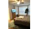 Spacious bedroom featuring lots of natural light, wood floors, and ceiling fan at 3530 Winding Walk Ct, Raleigh, NC 27616