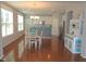 Open dining room and kitchen with modern island seating at 3530 Winding Walk Ct, Raleigh, NC 27616