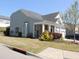 Attractive home features a well-manicured lawn, beautiful landscaping, and a side-entry garage at 3530 Winding Walk Ct, Raleigh, NC 27616