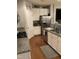 Well-lit kitchen featuring stainless steel appliances and granite countertops at 3530 Winding Walk Ct, Raleigh, NC 27616