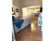 Inviting living room features hardwood floors and flows into a bright dining area and kitchen at 3530 Winding Walk Ct, Raleigh, NC 27616