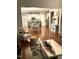 Open-concept living space flows from kitchen to dining and living areas, great for entertaining at 3530 Winding Walk Ct, Raleigh, NC 27616
