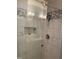 Close-up of modern shower stall featuring elegant marble tile surround at 3530 Winding Walk Ct, Raleigh, NC 27616