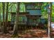 Back of the house featuring a lovely deck, offering a relaxing outdoor space at 3719 W Cornwallis Rd, Durham, NC 27705