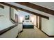 Charming bedroom with queen bed, unique wood-look closets, and exposed beams at 3719 W Cornwallis Rd, Durham, NC 27705