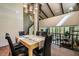 Open concept dining room featuring stylish lighting and views of the upper and lower levels at 3719 W Cornwallis Rd, Durham, NC 27705
