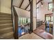 Bright and spacious living room with stairs leading to the upper level at 3719 W Cornwallis Rd, Durham, NC 27705