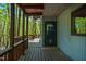 Charming covered porch with stylish features and ample space at 3719 W Cornwallis Rd, Durham, NC 27705