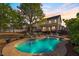 Inviting backyard pool with lounge chairs and deck area, perfect for outdoor relaxation and entertaining at 387 Windgate Dr, Clayton, NC 27527